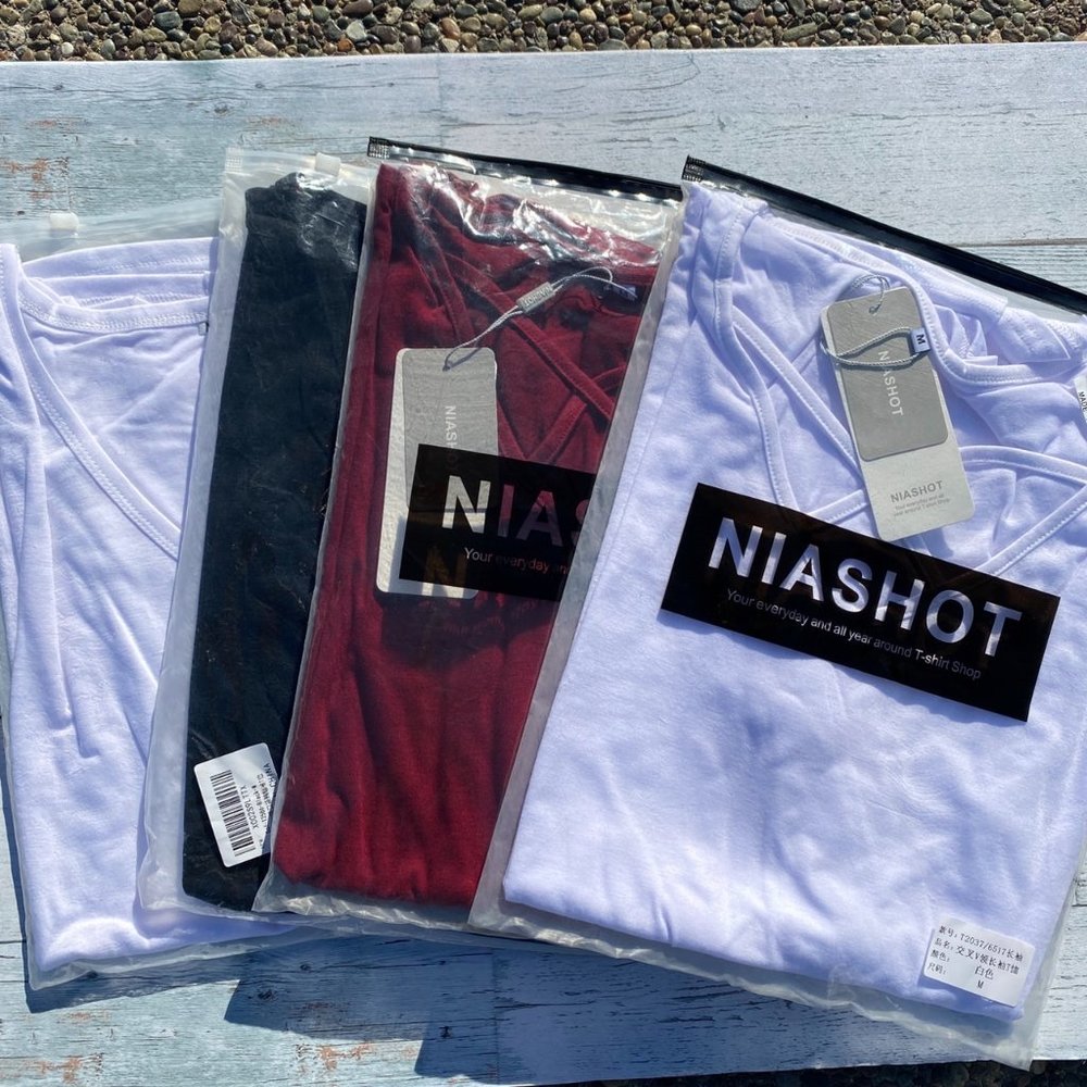 4 Medium Sized Womens Shirts by NIAShot